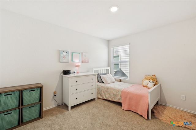 1004 Norway Dr, Seguin, TX 78155 - bedroom with light colored carpet and baseboards