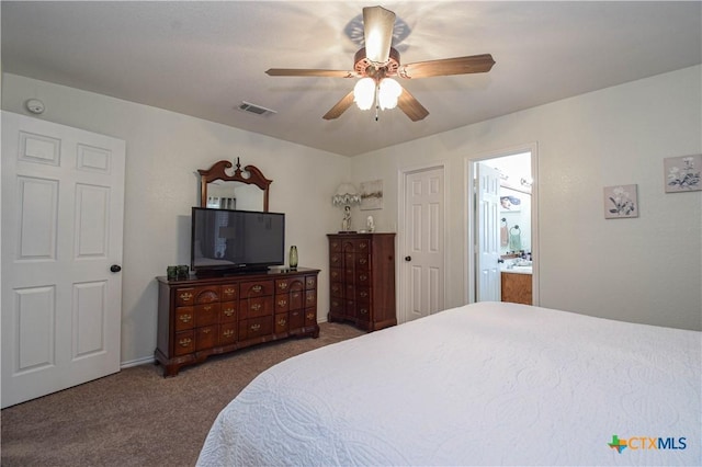 bedroom featuring carpet flooring, ceiling fan, connected bathroom, and visible vents