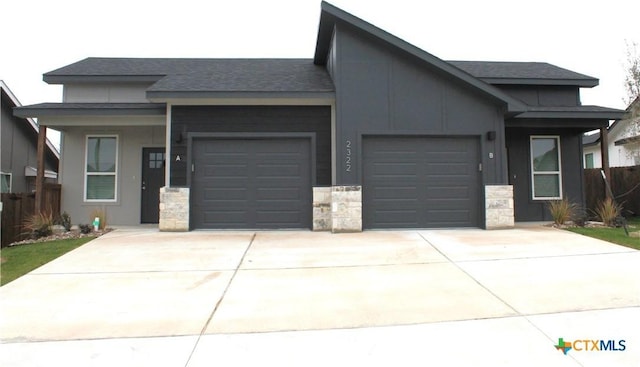 view of front of property with a garage