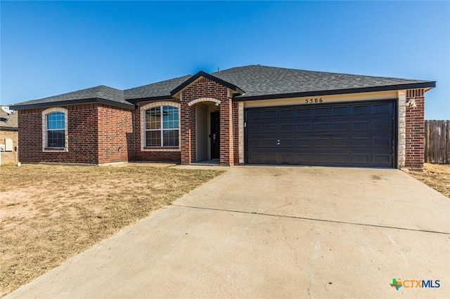 single story home with a garage