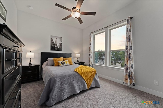 carpeted bedroom featuring ceiling fan