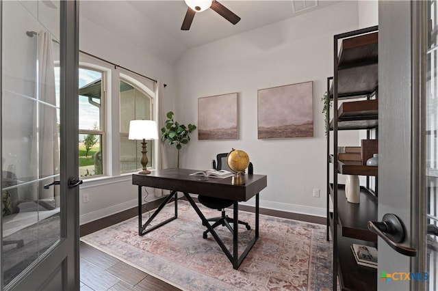 home office featuring vaulted ceiling, ceiling fan, and french doors