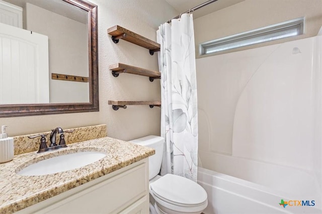13 Mojave Ln, Belton, TX 76513 - full bath with vanity, shower / bath combination with curtain, and a textured wall