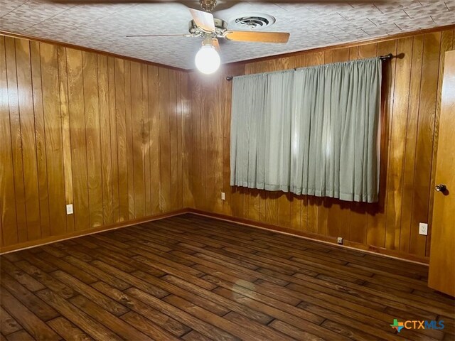 6414 Fm 234 N, Edna, TX 77957 - empty room with ceiling fan, wood-type flooring, and wooden walls