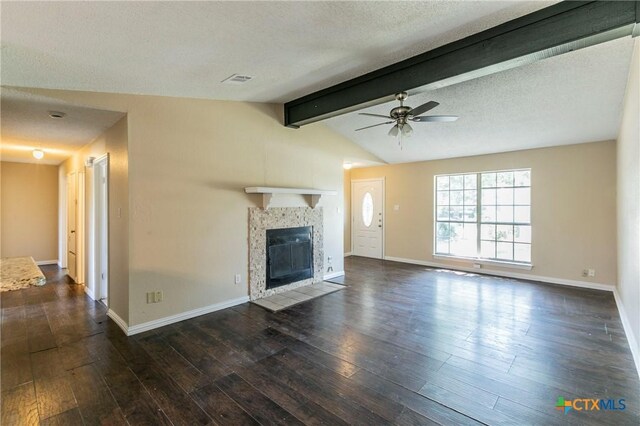 802 Antelope Trl, Temple, TX 76504 - unfurnished living room featuring a ceiling fan, dark wood-style floors, baseboards, and a fireplace