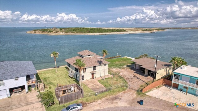 drone / aerial view with a water view