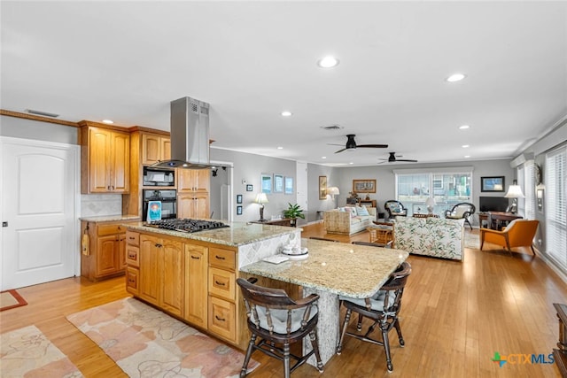100 Bayshore Drive, Ingleside On The Bay, TX 78362 - kitchen featuring black appliances, island exhaust hood, recessed lighting, a kitchen island, and a ceiling fan