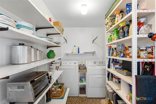 pantry with washing machine and dryer