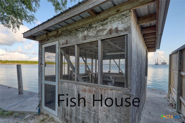 dock area with a water view