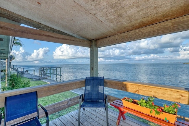 dock area featuring a water view