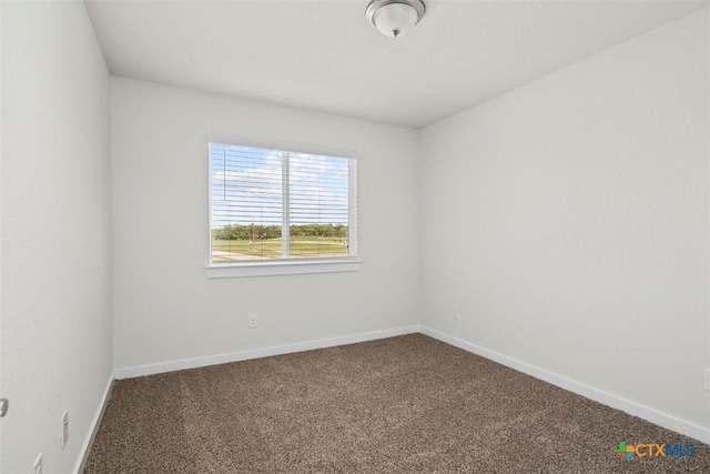 2508 Torbensen Ct, Temple, TX 76504 - unfurnished room featuring dark carpet and baseboards