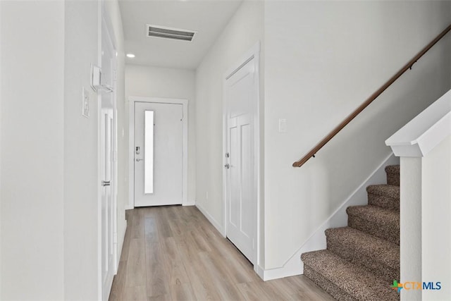 2508 Torbensen Ct, Temple, TX 76504 - entrance foyer with light wood-type flooring and stairs