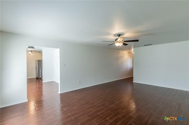 spare room with ceiling fan