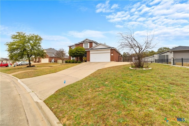 view of front of property with a garage and a front lawn