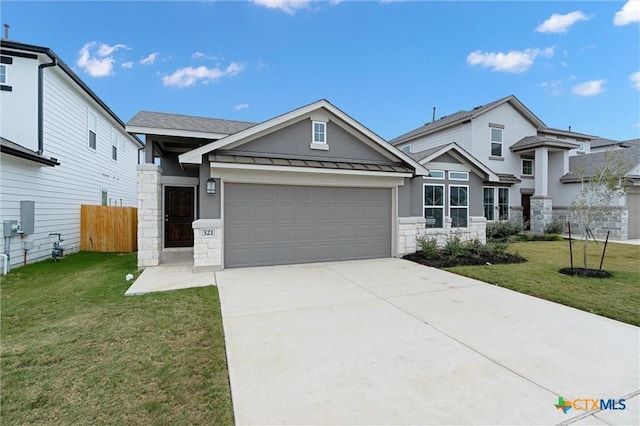 view of front of house with a garage and a front yard