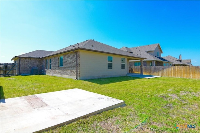 2521 Arno St, Harker Heights, TX 76548 - rear view of property with a patio area, a fenced backyard, and brick siding