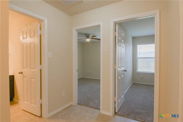 2521 Arno St, Harker Heights, TX 76548 - hall with light tile patterned floors and light colored carpet