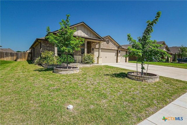 2521 Arno St, Harker Heights, TX 76548 - view of front facade featuring concrete driveway, board and batten siding, brick siding, and an attached garage