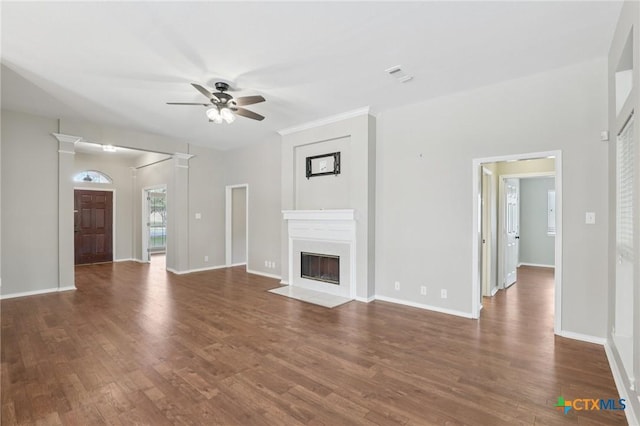 251 Las Brisas Blvd, Seguin, TX 78155 - unfurnished living room with ceiling fan, dark wood finished floors, a fireplace with flush hearth, and baseboards