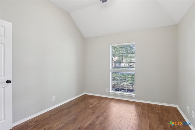 251 Las Brisas Blvd, Seguin, TX 78155 - unfurnished room featuring vaulted ceiling, dark wood finished floors, and baseboards