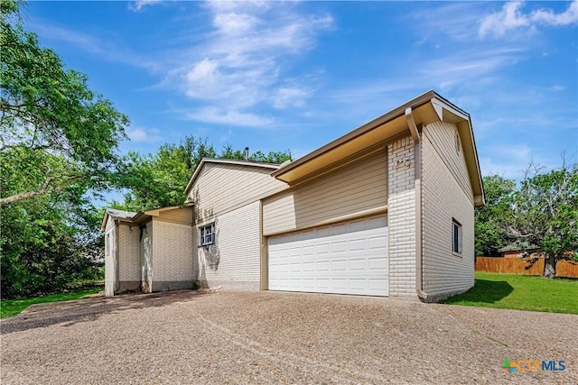 2006 Rose Cir, Harker Heights, TX 76548 - view of property exterior with concrete driveway, brick siding, and a garage