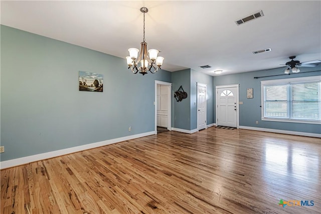 2006 Rose Cir, Harker Heights, TX 76548 - spare room featuring a chandelier, wood finished floors, and a ceiling fan