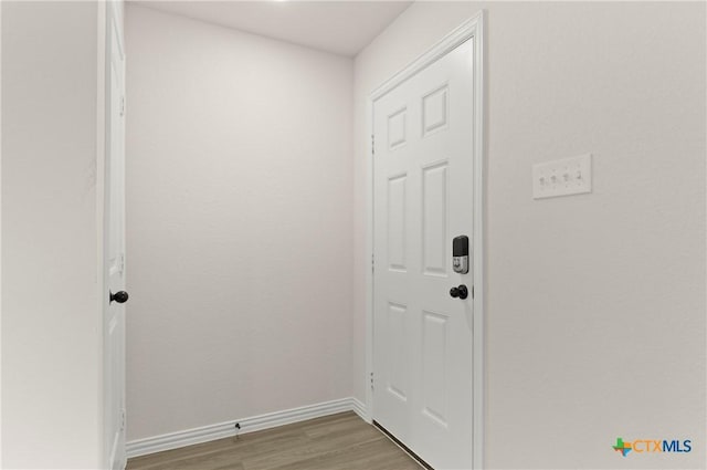 1007 Antelope Trl, Temple, TX 76504 - doorway to outside featuring wood finished floors and baseboards