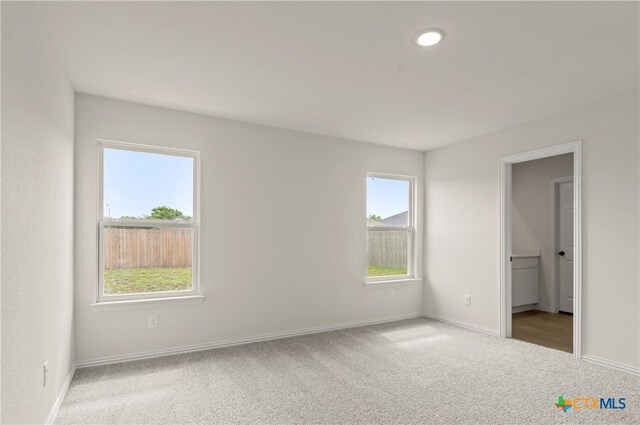 1007 Antelope Trl, Temple, TX 76504 - unfurnished bedroom featuring carpet and recessed lighting