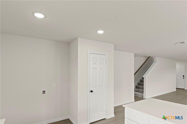 1007 Antelope Trl, Temple, TX 76504 - interior space with light wood-style flooring, stairs, and recessed lighting