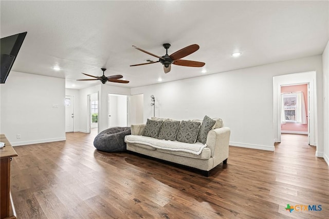 3801 Joshua Taylor Dr, Killeen, TX 76549 - living area with a ceiling fan, recessed lighting, wood finished floors, and baseboards