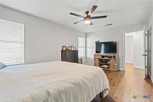 3801 Joshua Taylor Dr, Killeen, TX 76549 - bedroom with wood finished floors, baseboards, and ceiling fan