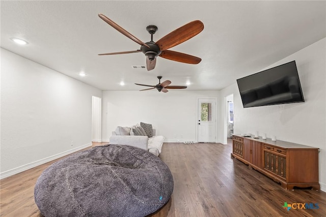 3801 Joshua Taylor Dr, Killeen, TX 76549 - living area featuring wood finished floors, ceiling fan, baseboards, and recessed lighting