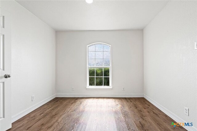 3801 Joshua Taylor Dr, Killeen, TX 76549 - empty room featuring wood finished floors and baseboards