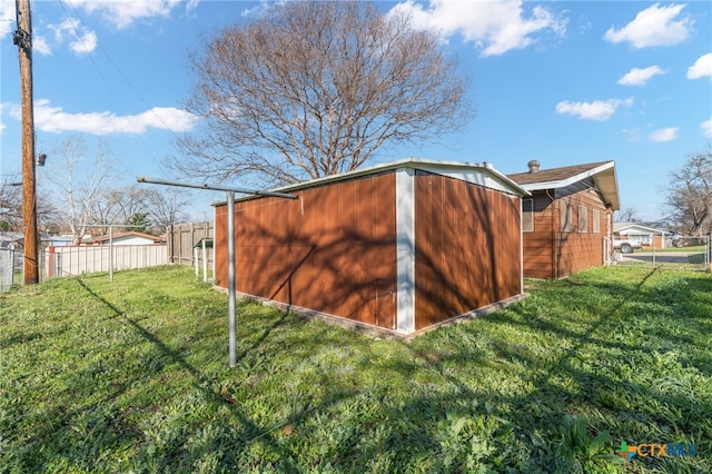 view of outdoor structure with a yard