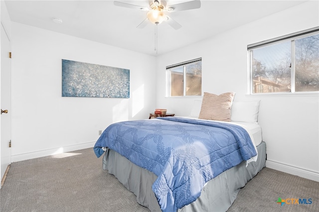 bedroom with light colored carpet and ceiling fan