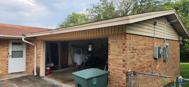 view of home's exterior with a garage