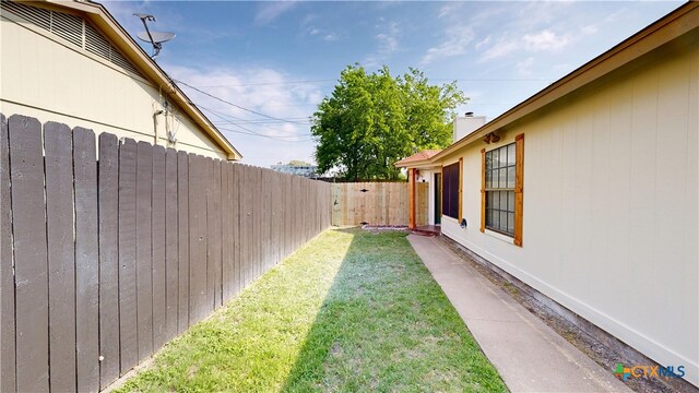 view of yard with fence