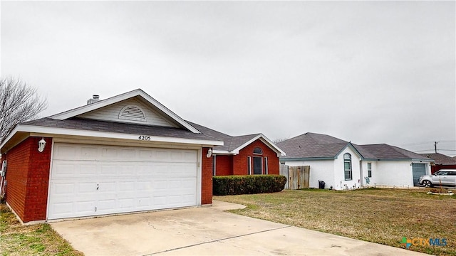 ranch-style home featuring driveway, brick siding, a front lawn, and an attached garage