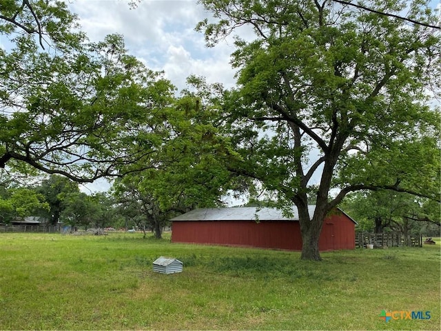 589 Bluebonnet Ln, Yoakum, TX 77995 - view of yard featuring an outdoor structure and a pole building