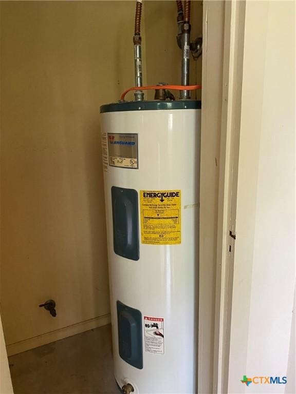 589 Bluebonnet Ln, Yoakum, TX 77995 - utility room featuring water heater