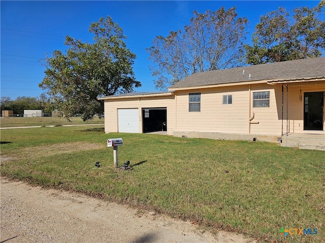 7318 Cryer Ln, Temple, TX 76502 - view of side of property featuring a yard and an attached garage