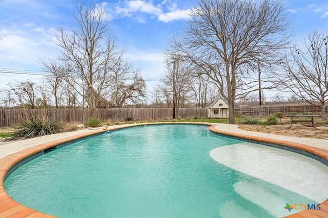 view of pool featuring fence and a fenced in pool