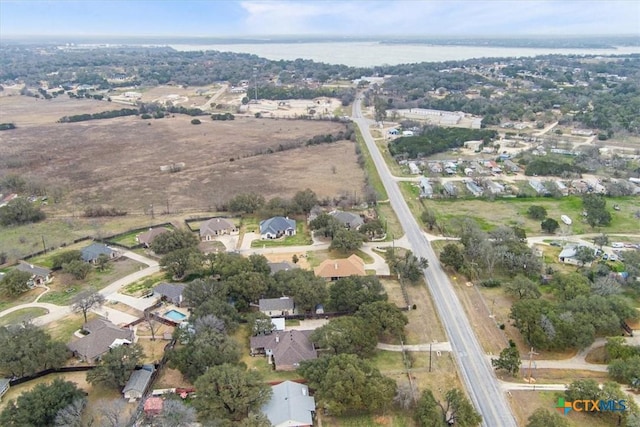 aerial view featuring a water view and a residential view