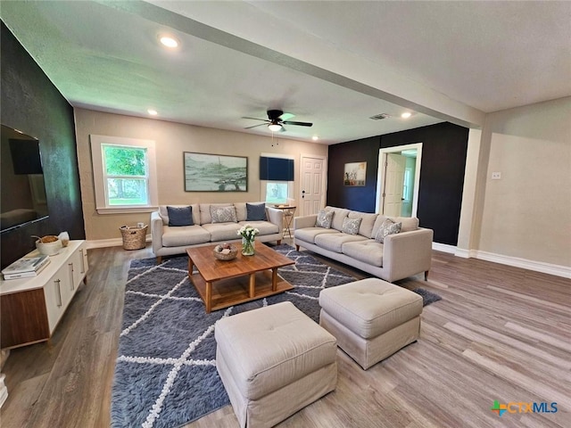958 E Humphreys St, Seguin, TX 78155 - living area with baseboards, wood finished floors, ceiling fan, and recessed lighting