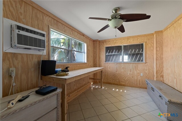 tiled home office with wood walls, a wall mounted AC, and ceiling fan