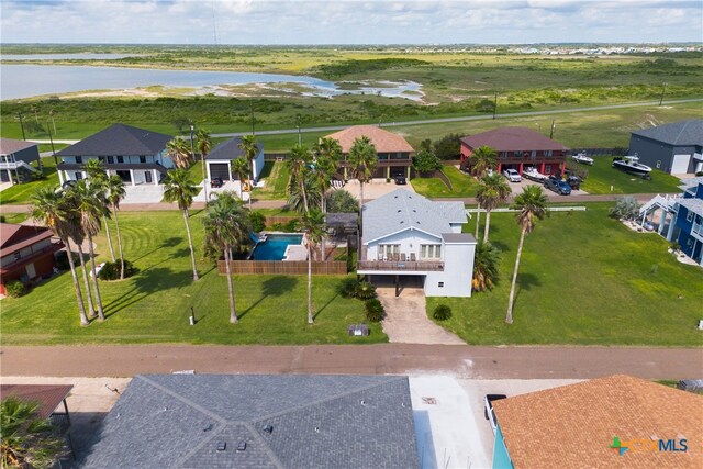 drone / aerial view with a water view