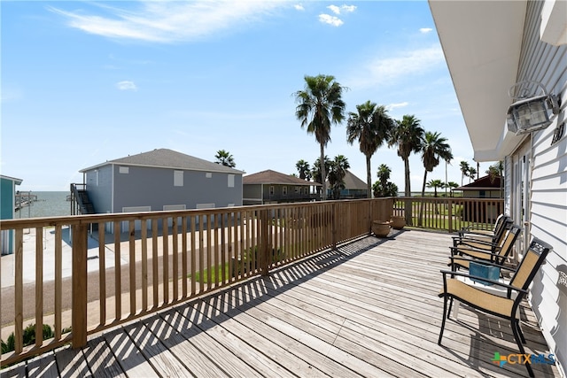 deck featuring a water view