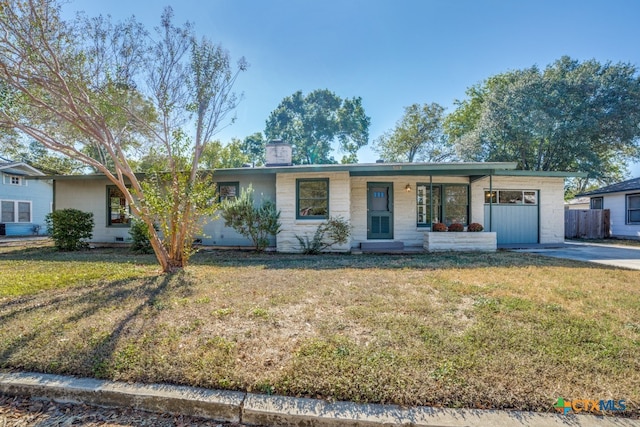 ranch-style home with a porch and a front lawn