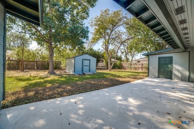 view of patio / terrace with a storage unit