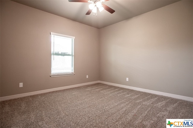 carpeted empty room with ceiling fan